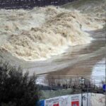 Fiume in piena per il maltempo