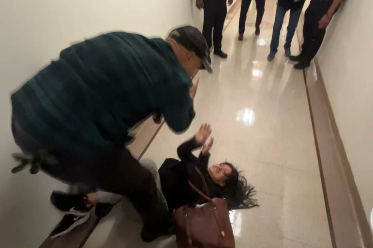 Donna buttata a terra