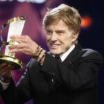 Redford alza un premio