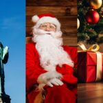 statua della libertà, babbo natale e pacchi regalo sotto l'albero