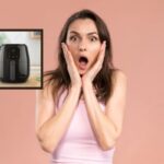 donna stupita con la bocca aperta e le mani sulle guance e friggitrice ad aria