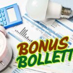 documento, sveglia, calcolatrice, lampadine e scritta