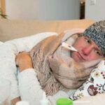 Uomo ammalato con sintomi di influenza