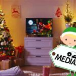 salotto natalizio grafica elfo e logo mediaset