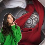 cestello asciugatrice e donna pensierosa